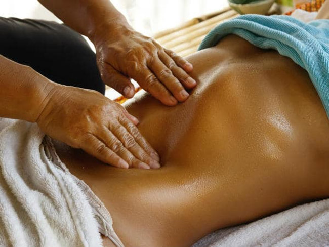 Bật mí cách massage giảm mỡ bụng bằng dầu dừa
